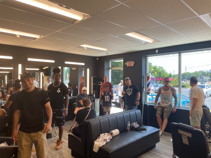 Inside Crowned Kutz, which offered free food and haircuts on Friday. (Ethan Hurwitz/Patriots Country)